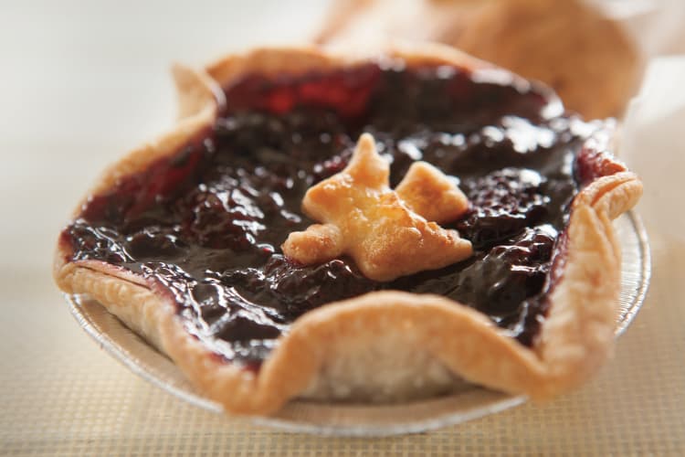 Homemade berry pie from a market vendor